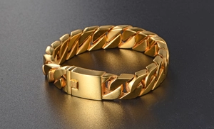 Detailed close-up of golden stainless steel cuban link bracelet with a square clasp