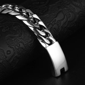 Polished silver stainless steel Cuban link bracelet for men with a secure snap clasp