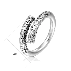 Detail view of 3mm stainless steel bypass ring with intricate cloud pattern engraving
