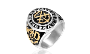 Macro detail of men's stainless steel United States Navy ring with golden anchor emblem