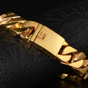 Polished gold cuban link bracelet for men with secure square box clasp closure
