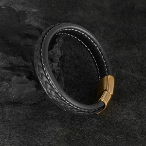 Bracciale da uomo in pelle nera intrecciata con chiusura magnetica dorata