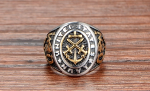 Detailed macro view of US Navy signet ring with gold anchor and cross swords emblem