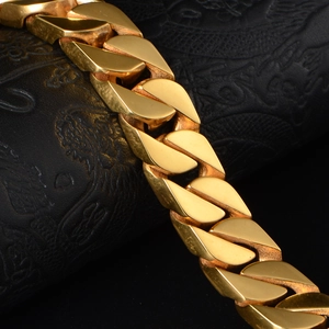 Chunky gold titanium steel Cuban link chain bracelet for men with polished finish