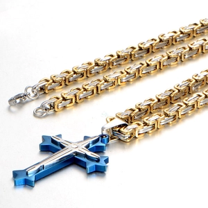 Men's blue and silver layered cross pendant on a two-tone Byzantine chain necklace