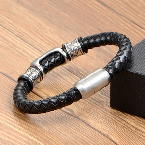 Men's braided leather bracelet with engraved stainless steel rings and magnetic clasp