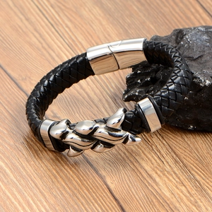 Men's black braided leather bracelet with silver metal rings and magnetic clasp decor