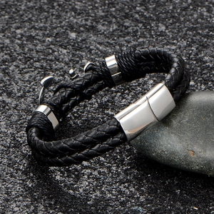 Vintage black braided leather bracelet with silver anchor charm and magnetic clasp