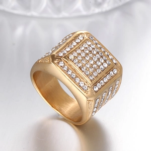 Detailed close-up of gold square signet ring with micro-pave white cubic zirconia stones