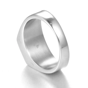 Detailed close-up of a wide polished stainless steel ring with a smooth silver finish