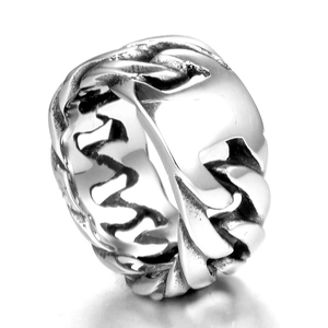 Macro shot of silver-tone woven chain ring featuring vintage oxidized metal details