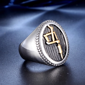 Vintage stainless steel signet ring with golden Chinese calligraphy on black textured oval base
