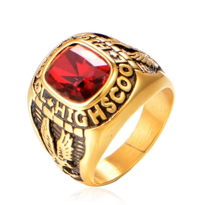 Gold eagle high school ring featuring a large square red gemstone centerpiece