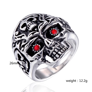 Macro detail of gothic skull ring with red zircon eyes and 26mm width steel band