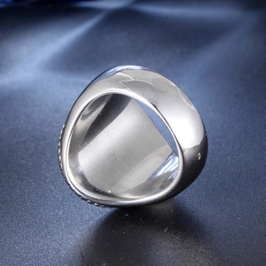 Detailed view of wide 316L stainless steel ring with polished mirror finish and silver tone