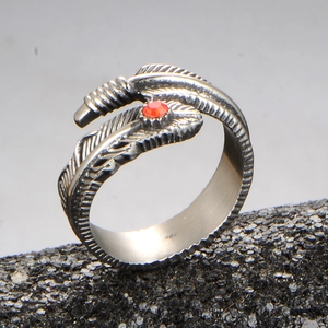 Bague plume en acier inoxydable vintage avec pierre orange sur pierre de lave