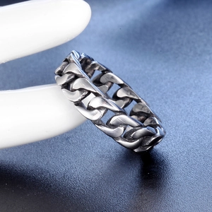 Vintage silver Cuban link chain ring in stainless steel for men on display stand