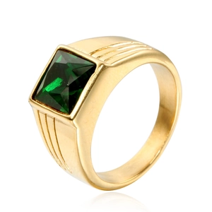 Detail of gold-plated signet ring featuring a large square-cut green gemstone and grooved band