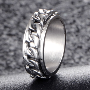 Polished silver stainless steel spinner ring with inlaid Cuban chain on black leather
