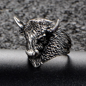 Retro stainless steel bull head ring for men with vintage punk style aesthetic