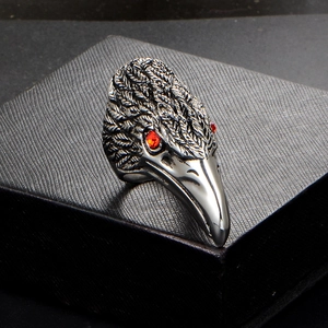 Vintage stainless steel bird head ring with red zircon eyes and feather texture details