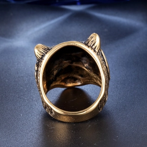 Detailed back view of vintage tiger head ring in antique gold finish with engraving
