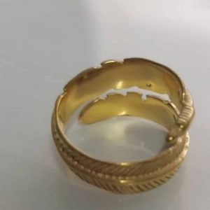 Golden stainless steel feather open ring with detailed engraving in punk style jewelry