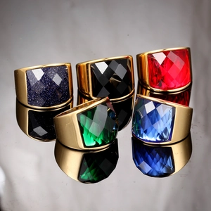 Detailed macro view of retro square gemstone rings in multiple colors with gold plating
