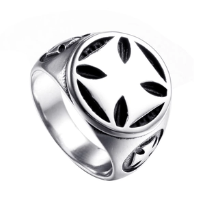 Detailed top view of a vintage stainless steel ring with hollow cross star engravings