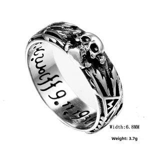 Detail view of gothic skull ring with 9.11.1936 engraving and vintage silver finish