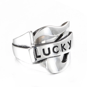 Bague spinner en acier inoxydable argenté avec gravure LUCKY et motif vague