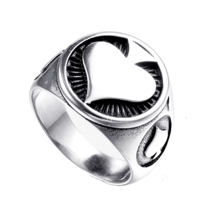 Vintage spade heart stainless steel ring with oxidized punk finish on white background