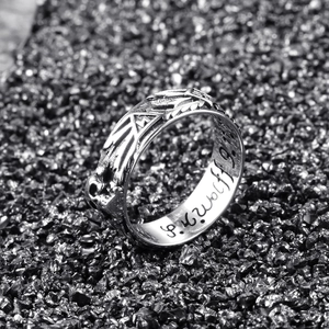 Gothic punk skull ring for men with vintage runes and Celtic carvings on silver metal band