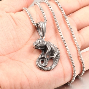 Vintage silver chameleon lizard pendant necklace with detailed scales on a box chain