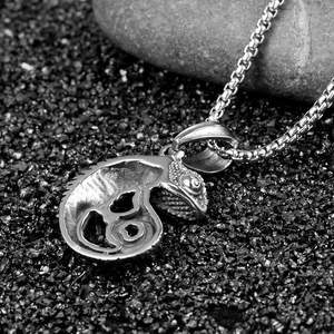 Retro stainless steel chameleon pendant necklace with textured scales on a black box chain