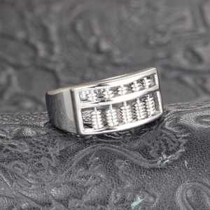 Minimalist spinning abacus ring for men made of polished silver titanium steel