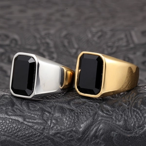 Men's vintage signet ring with rectangle black onyx gemstone in gold and silver steel