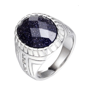 Anillo de moda de acero inoxidable con piedra azul ovalada y diamantes laterales