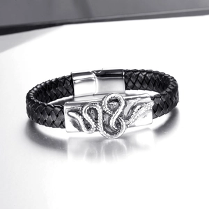 Vintage punk woven black leather bracelet with a silver snake embossed metal buckle