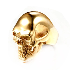 Polished golden stainless steel skull ring for men with detailed 3D punk design