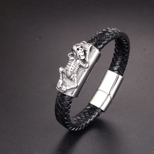 Mens black braided leather bracelet with silver skull charm and magnetic clasp closure