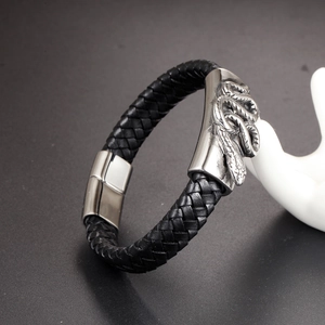 Braided leather punk snake bracelet for men featuring a silver metal clasp on a hand stand
