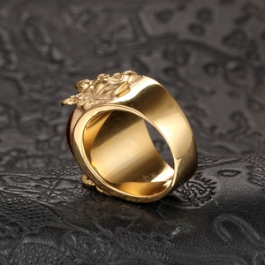 Vintage gold plated titanium ring with red gemstone and intricate relief carving
