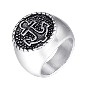 Detailed view of men's vintage nautical ring with anchor relief and rope textured border