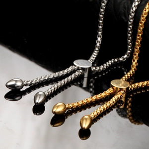 Adjustable stainless steel penguin style bracelets in gold and silver with slider clasp