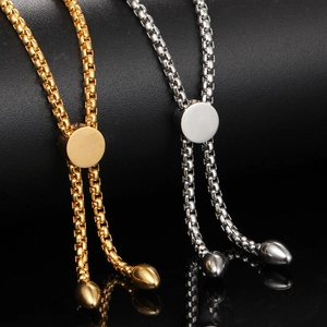 Adjustable stainless steel penguin charm box chain bracelet in gold and silver finish