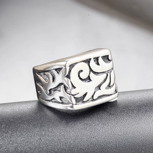 Retro punk stainless steel ring with engraved tribal patterns for men in vintage silver
