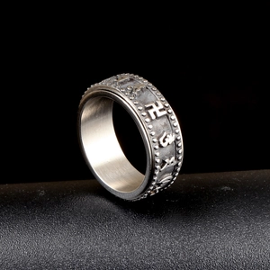Anello rotante vintage in acciaio al titanio con mantra buddista e simboli incisi
