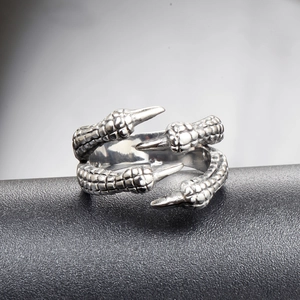 Detailed view of the dragon claw texture and stainless steel finish on this punk rock ring