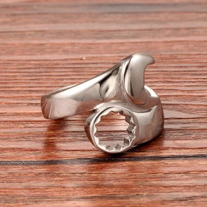 Detailed view of titanium steel wrench ring with industrial spanner design and open band